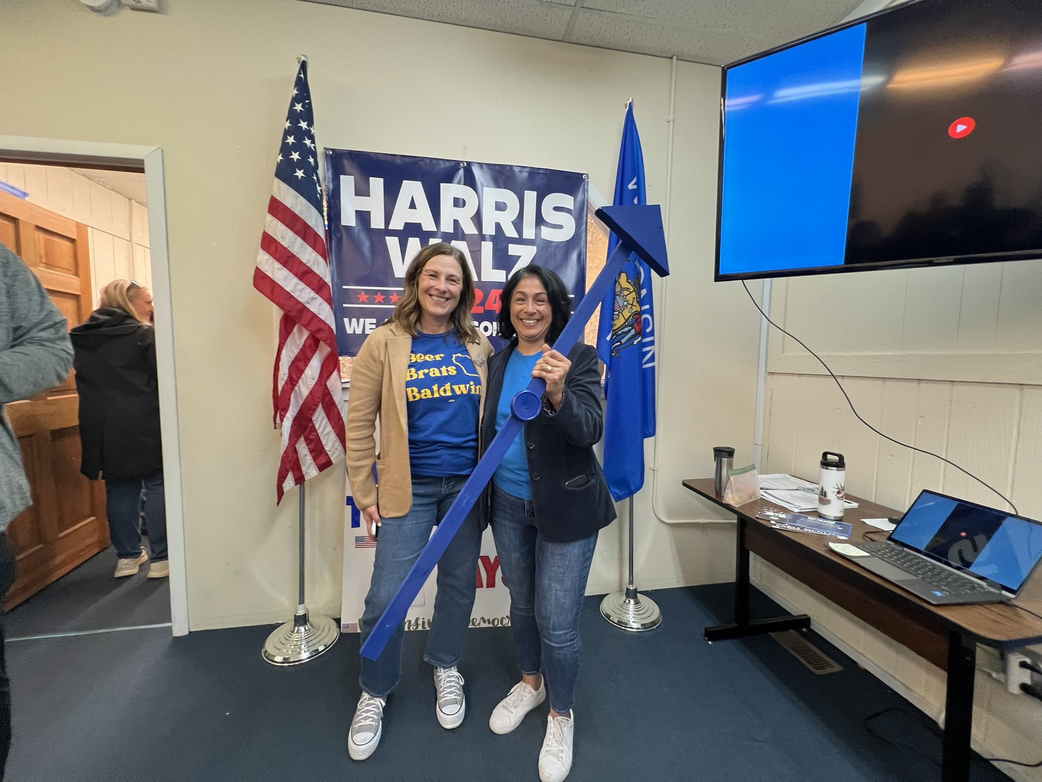 Chair Hernadez standing and smiling with a Wisconsin Democrat